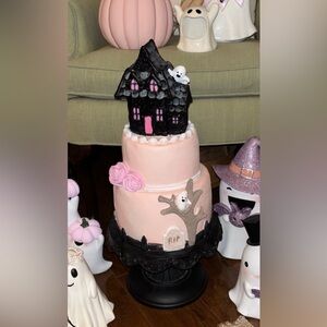 Pink Halloween 3 tiered cake with haunted house
